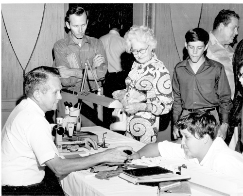 Dr. Al Kidwell at the Mineral ID Booth in 1969