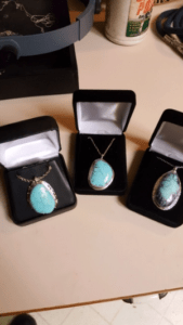 silversmithing pendants - turquoise cabochons set in silver pendants