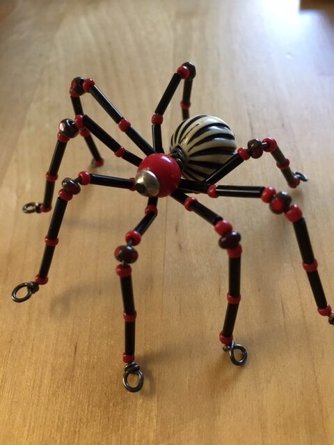 beaded black and red spider