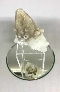 Quartz after Calcite on "U" stand on mirror