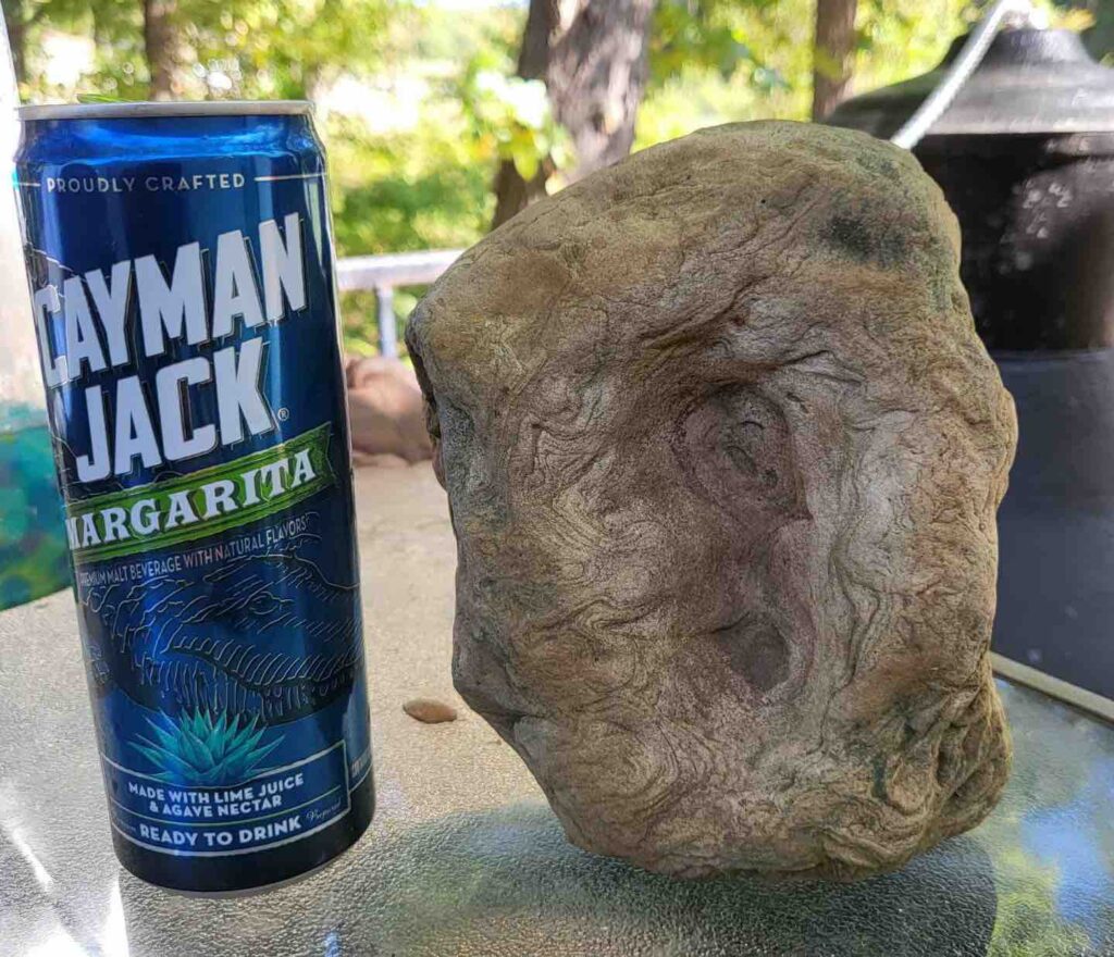 Concretion with can for scale