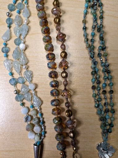 multiple strands of beads using a pearl knotting technique